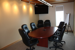 small meeting room with table and chairs